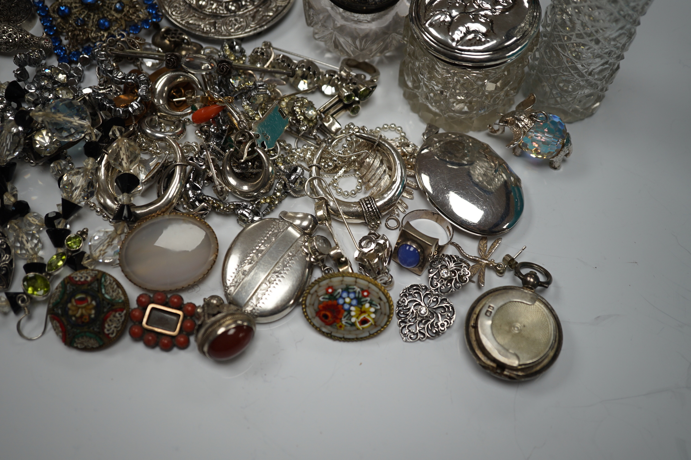 Sundry small silver including mounted glass toilet jars and a Georgian sifter spoon, together with assorted silver and other jewellery including earrings, pendants, brooches etc.